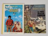 deux livres posés sur une table blanche, avec la photo d'un homme et d'une femme