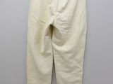 a close up of a pair of pants hanging on a wall