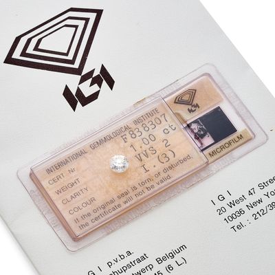 a close up of a piece of paper with a diamond on it