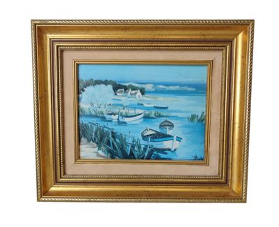 tableau représentant des bateaux sur l'eau, dans un cadre doré