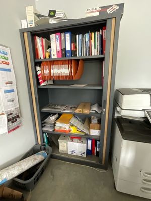 a book shelf with a bunch of books on it