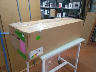 a large box sitting on top of a table in the middle of a room