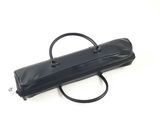 black leather case with a handle for a cell phone on a white surface