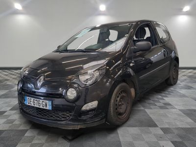 a picture of a small black car parked in a garage
