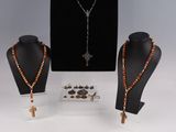 an assortment of jewelry including a necklace, bracelet, and ring
