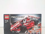 a box of lego technics on a table