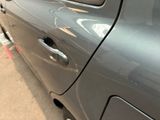 a close up of a car ' s door handle and door handle