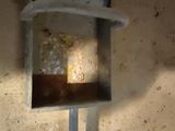 a light that is on on the wall next to a lamp