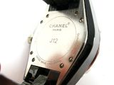 a close up of a watch being held by a person