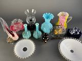 a lot of glass items that are on the table