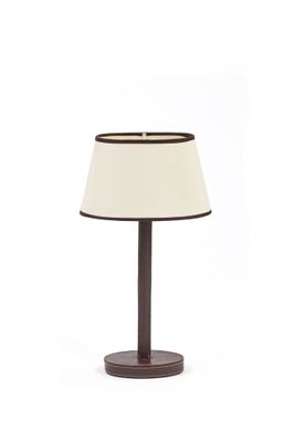 a small lamp with a white shade on top of it