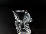a clear glass vase that is sitting on a table