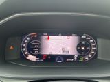 the dashboard of a car with a digital display in the center