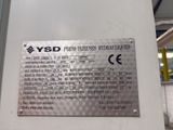 a sign on the side of a machine that says ysd