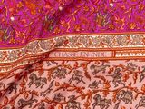 an image of a close up of a pink and orange shawl