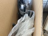a cardboard box with a bunch of items inside of it
