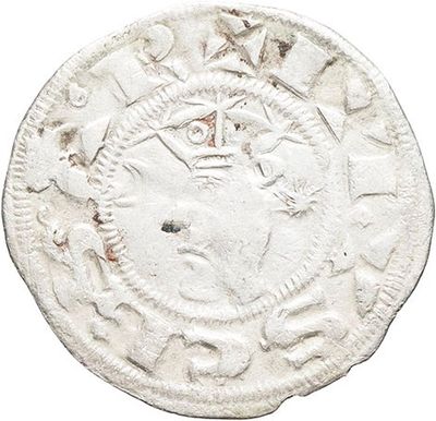 a white coin with a crown on top of it