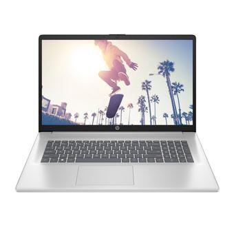 un ordinateur portable avec un skateboard à l'écran et des palmiers en arrière-plan