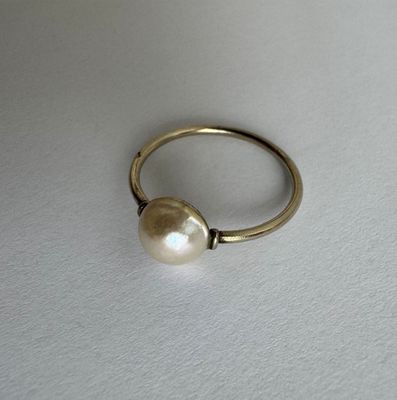 gold plated ring with a pearl bead