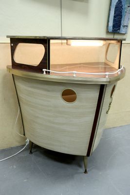a small boat that is sitting in a room