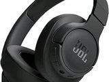 the jbl headphones are black and have a built - in microphone