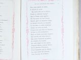 a book open to a poem with a picture on it