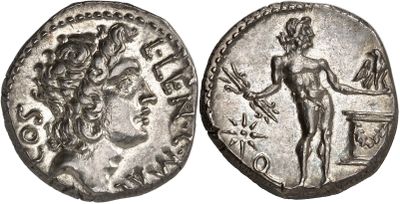 a silver coin with an image of a woman holding a sword