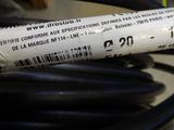 a close up of a tube of electrical wire on a table