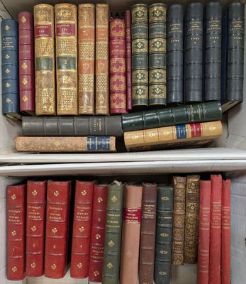 many books that are on the shelves in the room