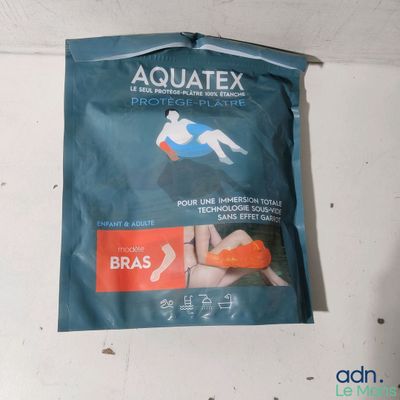 a bag of aquatex on the wall of a bathroom