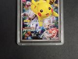 an image of a pokemon trading card in a plastic case