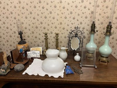 a wooden table with a lot of items on it