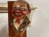 a bottle opener with a picture of a man on it