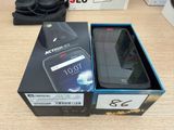 packaging of a box with a phone inside of it on a table