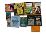 a lot of books that are sitting on a table