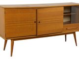 the sideboard is made of wood and has a glass door