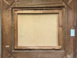 an old picture frame with a picture of a cat in it
