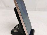 a cell phone that is sitting on a stand