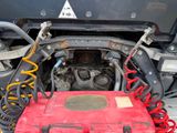 a red box that is under the hood of a car