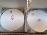 packaging of two white bowls with red writing on them in a box