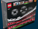 a box with a lego model of a soccer stadium