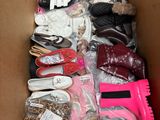 many pairs of shoes in a box with a blow dryer