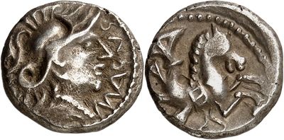 a silver coin with an image of a man on it