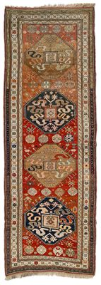 un tapis rouge et bleu sur fond blanc