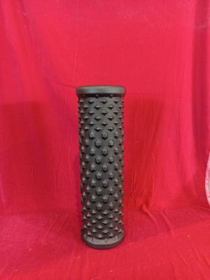 two vases that are sitting on a red cloth