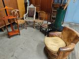 a room with a lot of chairs and a table