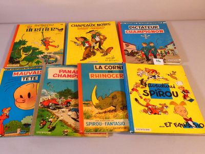 plusieurs livres pour enfants sont alignés sur une surface blanche