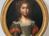 portrait of a young girl in a green dress with a red sash