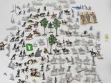 a lot of toy figurines that are on the table