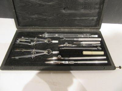 a black case with tools in it sitting on a table